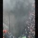A fire breaks out behind the goal during the Dutch final football match