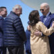 President Joe Biden, from right, is greeted by New York Gov. Kathy Hochul, Senate Majority Leader Chuck Schumer, D-N.Y., and County Executive Ryan McMahon, as he arrives at Hancock Field Air National Guard Base