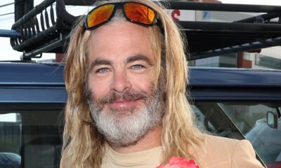Chris Pine plays 'Poolman' character in Jorts, long blond hair