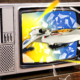 a spaceships breaks through an old tv with glass flying
