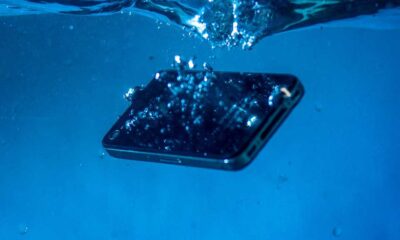 A smartphone falling into water
