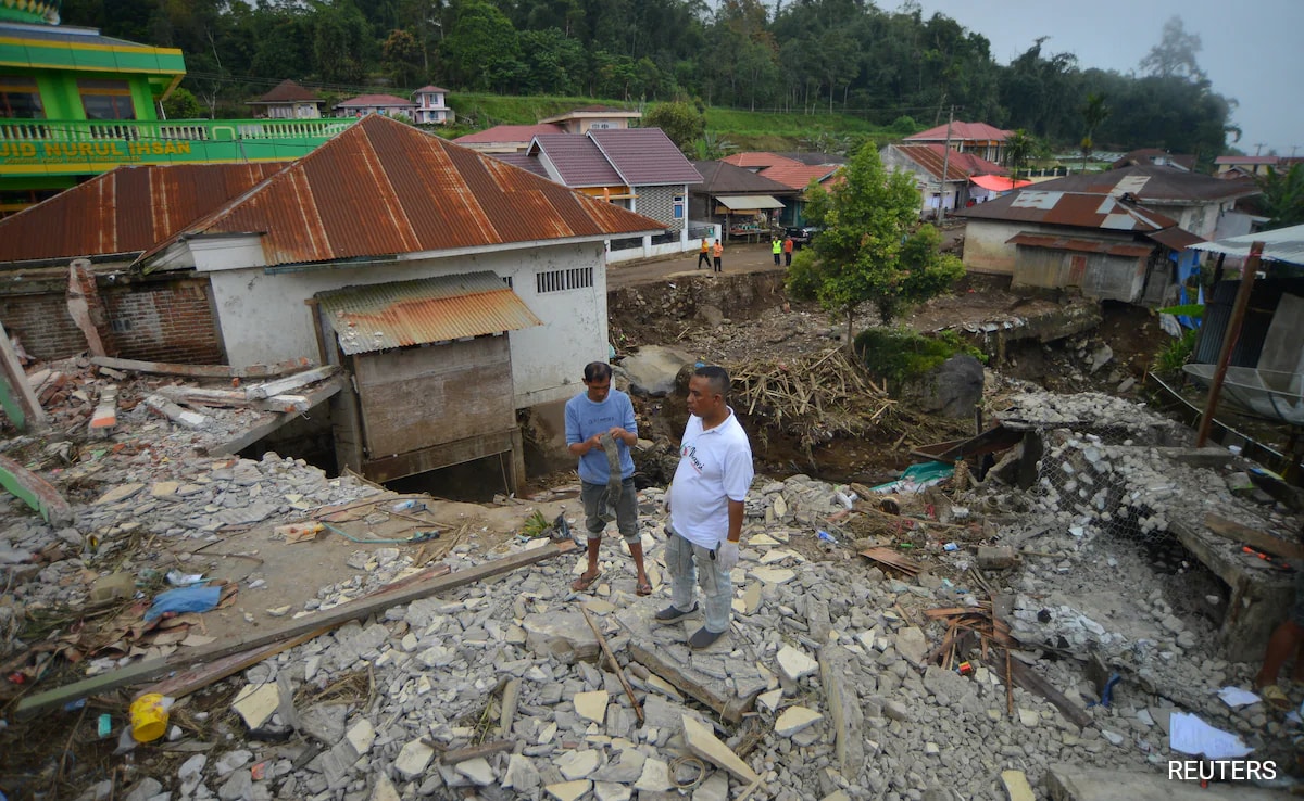 58 dead in flash floods in Indonesia, search for 35 missing