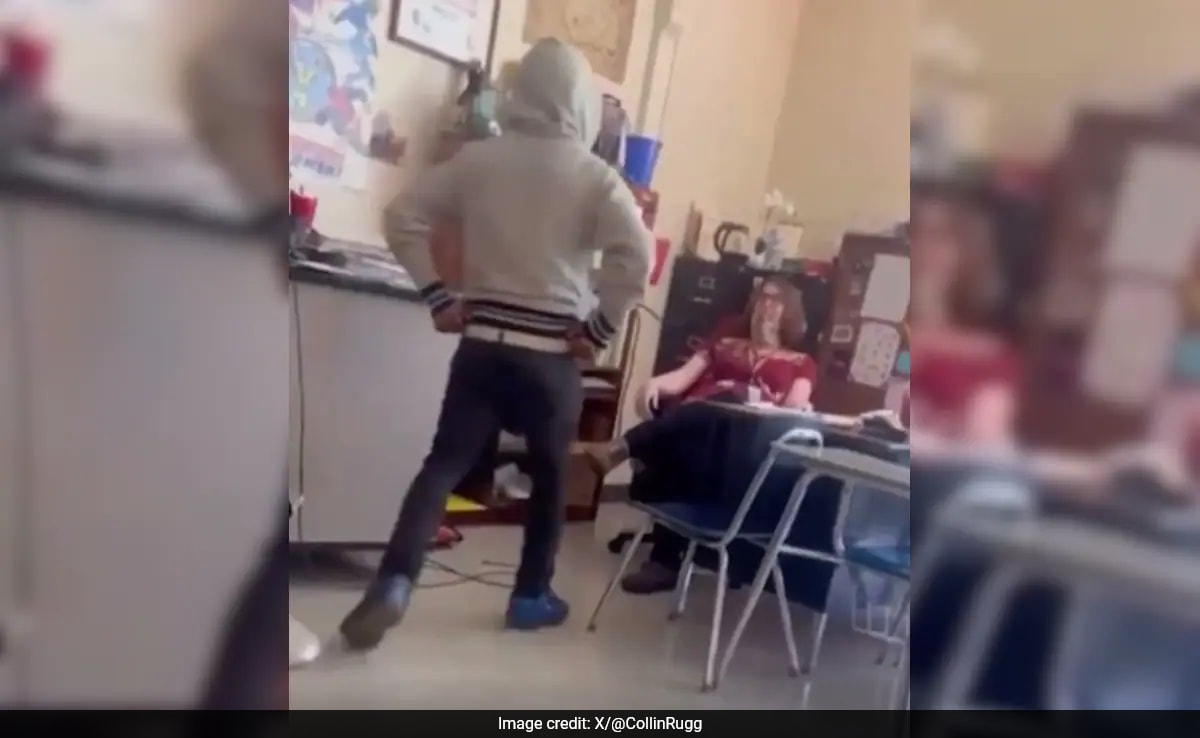 American teenager who punched teacher in class is charged with kidnapping and assault