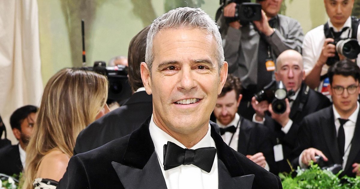 Andy Cohen responds to a meme about how he can't pose with his hands