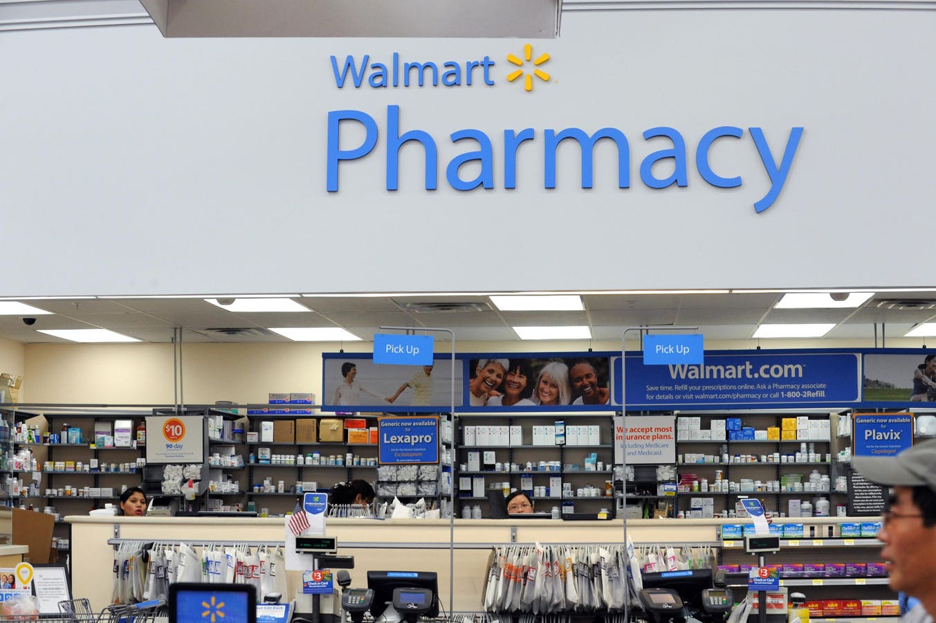As their clinics sputter, Walgreens and Walmart are investing more in specialty pharmacies