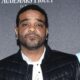 Rapper Jim Jones gets involved in a wild three-man fight on the escalator of the Florida airport