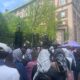 Protesters gather at the 116th Street gate at Columbia University.