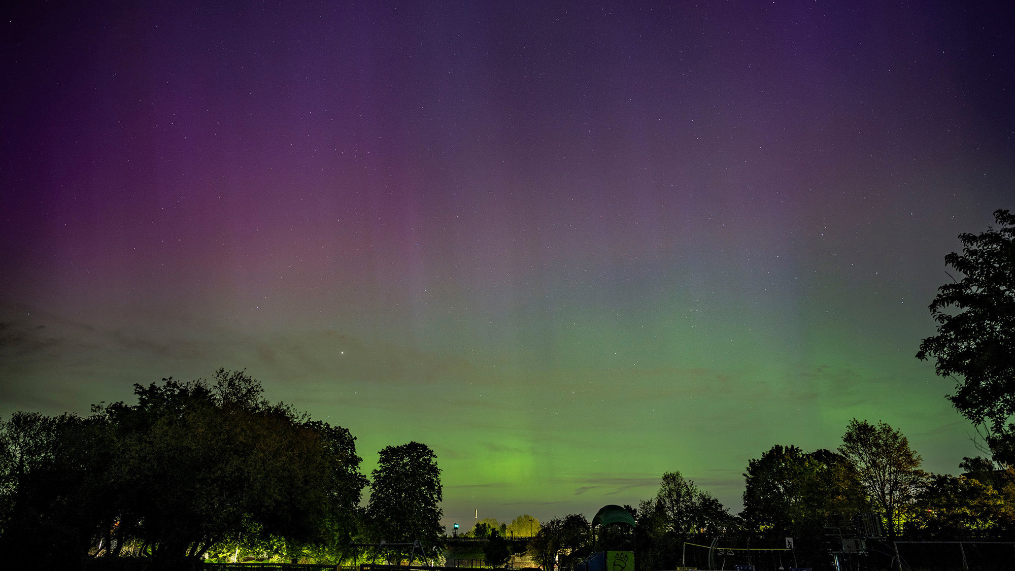 Why low-light events, like the Northern Lights, often look better through your phone's camera