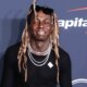 Lil Wayne's ex-bodyguard is fighting to keep the lawsuit against the rapper from being thrown out