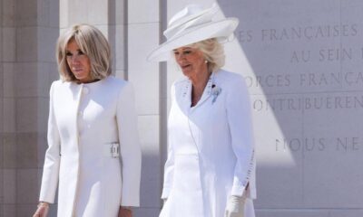 Queen Camilla plays coy with Brigitte Macron at the D-Day War Dead Memorial