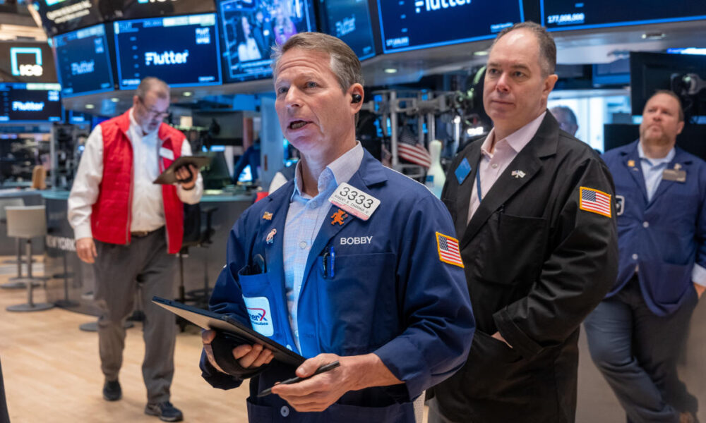 S&P 500 and Nasdaq set new records as big week starts on Wall Street
