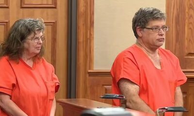 White couple accused of forcing adopted black children to work as slaves and live in a barn