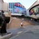 Debt-laden theater chain AMC reaches new refinancing deal