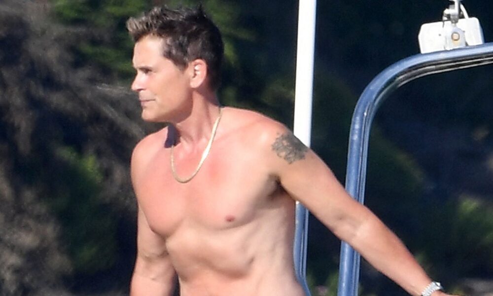 Rob Lowe Shows Off Shirtless Physique at 4th of July Beach Party