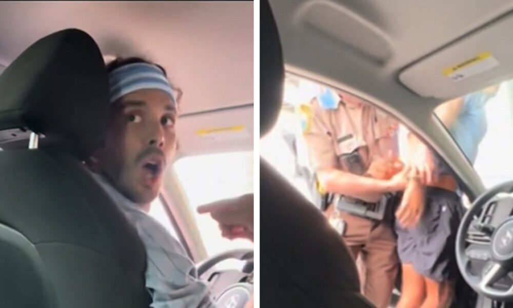 Uber driver is pulled from car and handcuffed by aggressive police officer in Florida