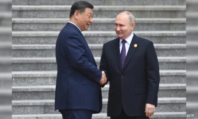 Xi Jinping after meeting with 'old friend' Vladimir Putin in Kazakhstan