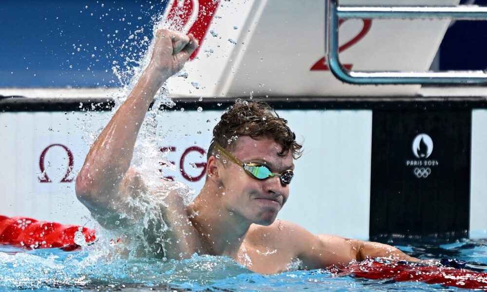 Léon Marchand completes unprecedented double, winning gold in 200M butterfly and 200M breaststroke